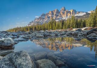 A reflection of castle mountain in banff national park canada