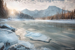 An iceberg on a river on a winter morning during sunrise in canadian rocky mountains Jasper National Park