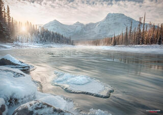 An iceberg on a river on a winter morning during sunrise in canadian rocky mountains Jasper National Park