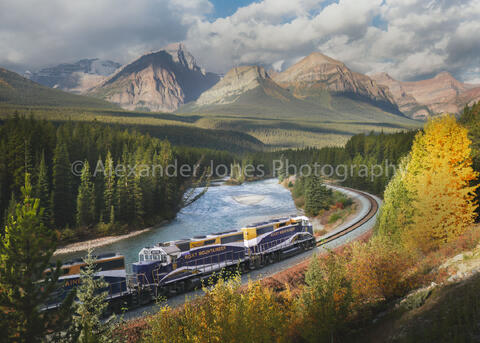 rocky mountaineer at morant's curve in banff national park during fall
