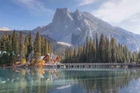 Emerald lake on a sunny fall afternoon with mount burgess in the background