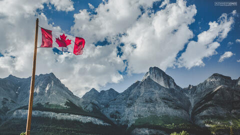 canadian flag in canadian rocky mountains in banff national park and jasper national park 