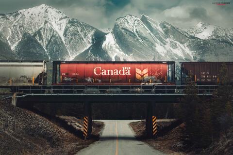 canadian train against the stark backdrop of the canadian rocky mountains