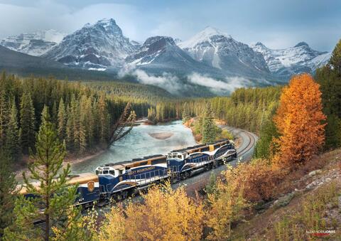 rocky mountaineer at morant's curve in banff national park during fall