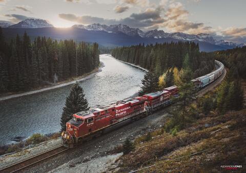 A CP train during sunset in Banff National Park in the canadian rocky mountains during fall
