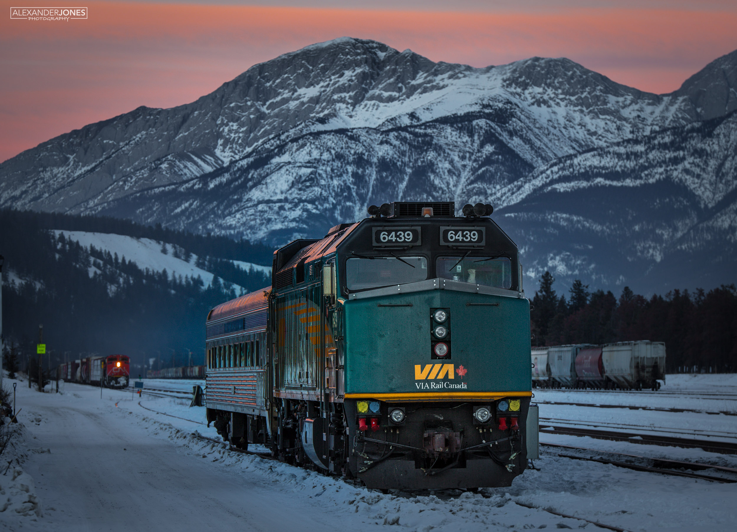 Double-Double Canada VIA rail train in station during sunset in Jasper National Park in canadian rocky mountains