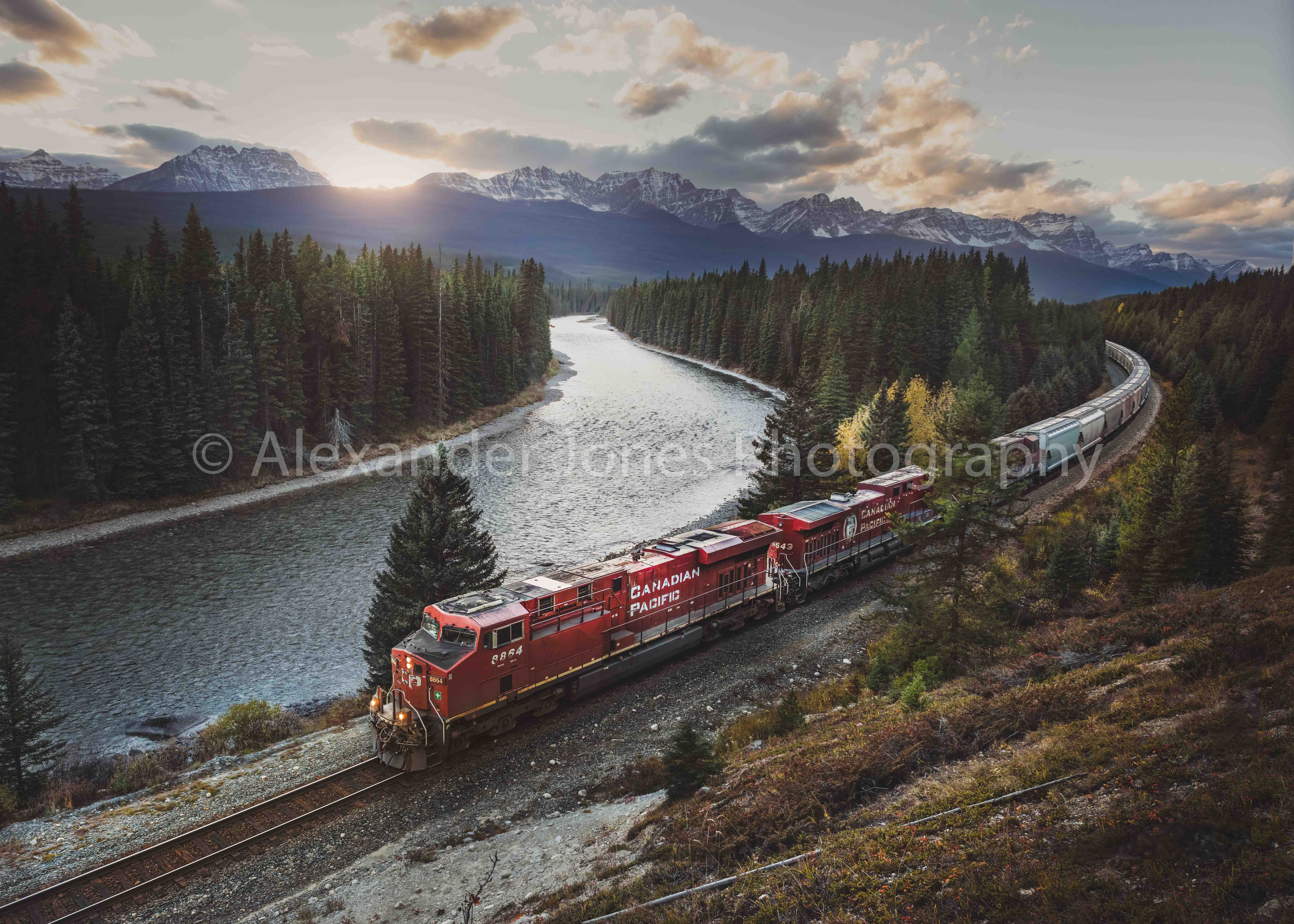 Walk in the Park A CP train during sunset in Banff National Park in the canadian rocky mountains during fall